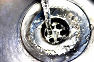 Sink drain runs clear after clog repair