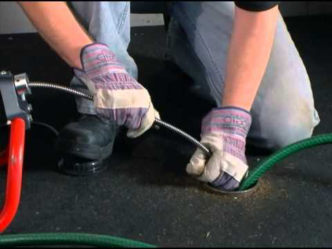 Plumber in North Miami Beach demos a Rigid drain snake