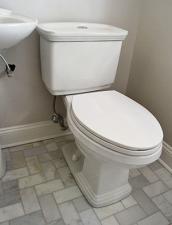 Low flow toilet installed by one of our plumbers